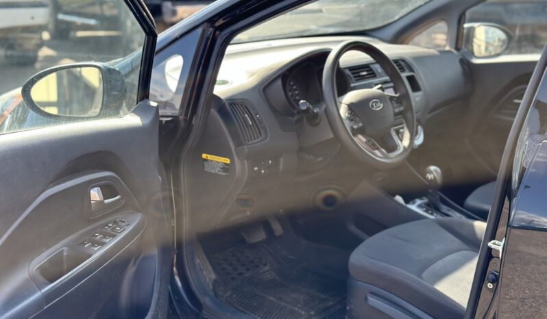
								2013 Kia Rio full									